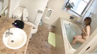 Gorgeous Japanese slut Naho oils up her pretty body and then fingers her hairy muff
