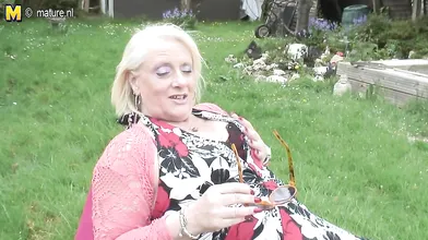 Naughty British housewife playing in the garden