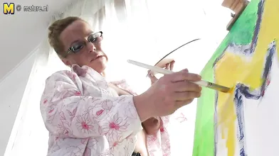 Creative housewife getting naughty during painting