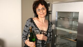 Horny mature slut loves masturbating while drinking champagne