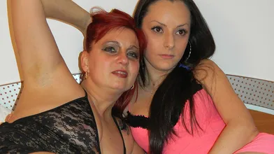 Horny mature slut doing her young lesbian lover