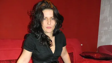 Mature slut masturbating on the couch