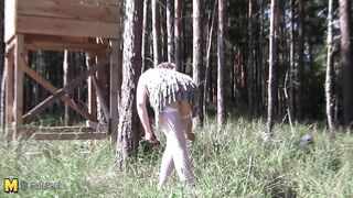 Squirting mature slut masturbating in the woods