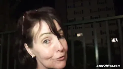 Amateur granny Joyce Mifle sucks and fucks big cock in condom back home