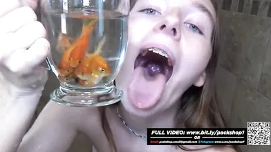 Becky feeding on fish in the shower - Vore Giantess