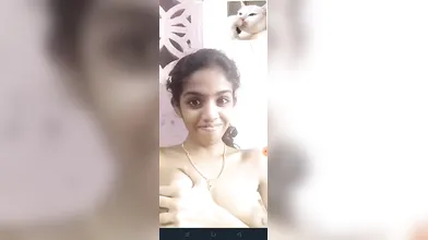 Tamil young girl boobs pressing