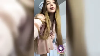 Sexy Adrianna Savu in dark-hued sundress plays with a enormous dildo, running in