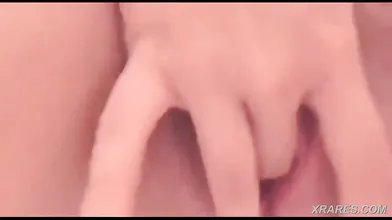 She fingers her smooth tight pussy