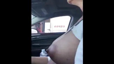 Mature Woman Touches Her Big Boob Rolling Next To A Trucks