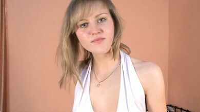Julianna shows a 'no panties upskirt'. She undresses and
