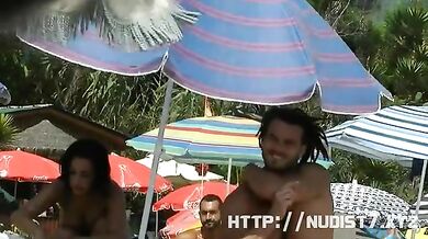 This nudist babes naked at the beach