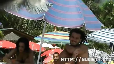 This nudist babes naked at the beach