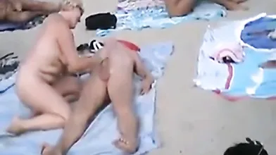 Couples have Sex at a public nude beach