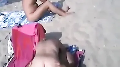 Couples have Sex at a public nude beach