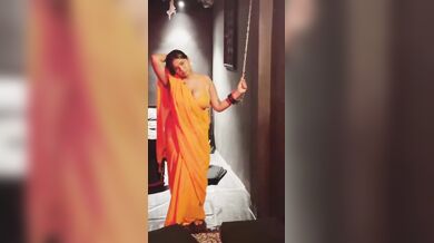 Oasi Das Model Teasing In Orange Saree
