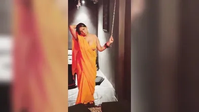 Oasi Das Model Teasing In Orange Saree