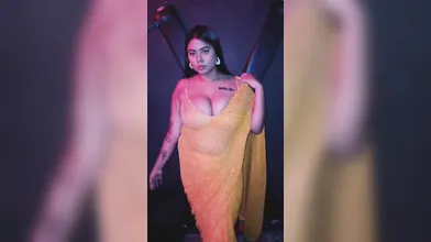 Oasi Das Model Teasing In Orange Saree