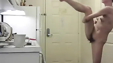 Skinny redhead with tiny tits and a hairy pussy dances on w