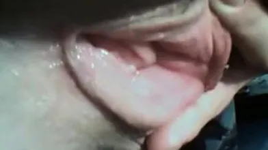 Close-up webcam footage of a woman's pussy and ass