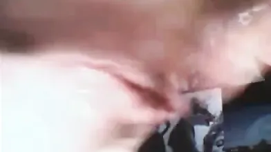 Close-up webcam footage of a woman's pussy and ass