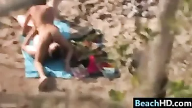 Couple Doing A 69 At The Beach