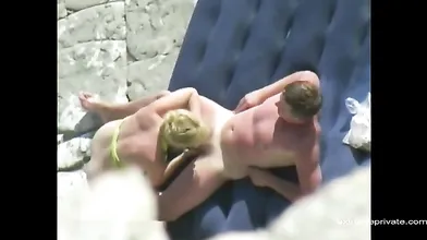 my mom and her lover on a private beach