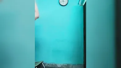 Shruti fingering her pussy while standing and legs open