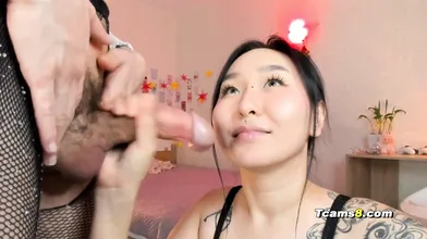 Horny babe sucks and jerks transgirl dick.