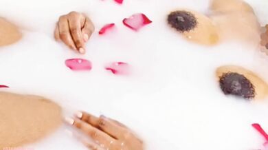 Tamil Wife relaxing milk bath in tub