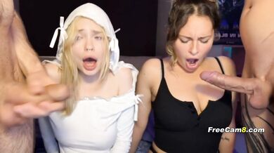 Two Slutty Babes Sucking Cock Side by Side