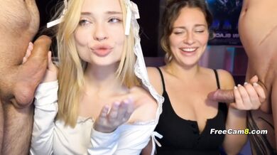 Two Slutty Babes Sucking Cock Side by Side