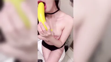Sucking Banana In The Bathroom