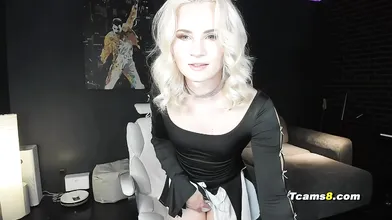 Blonde Transgirl in Black Top Shows Her Hard Cock