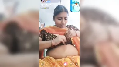 Gouthami reddy manthena sexy in orange saree removing blouse no bra inside showing Big milky nude boobs in video call ????
