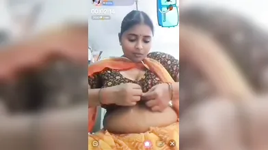 Gouthami reddy manthena sexy in orange saree removing blouse no bra inside showing Big milky nude boobs in video call ????