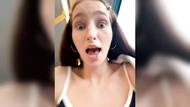 Brunette Woman Shows Natural Assets in Train Car - Yes They Are Real
