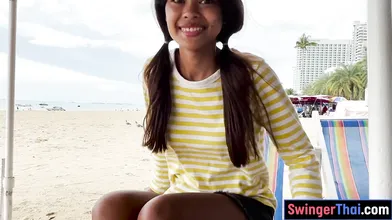 Cute Thai teen amateur takes a big white cock in her petite pussy