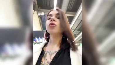 Stunning Tattooed Woman Flirts and Poses in Store and Restroom