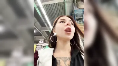 Stunning Tattooed Woman Flirts and Poses in Store and Restroom