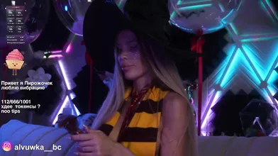 Sexy Blonde in Witch Hat at Neon Party - Cosplay Halloween Vibes
