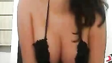 Big tits brunette posing for the cam in sexy lingerie