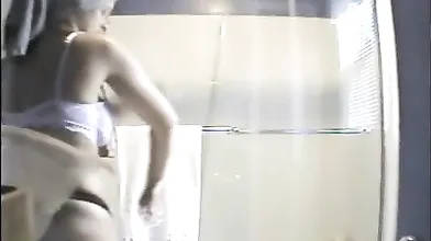 Peeping on naked busty roommate in the shower