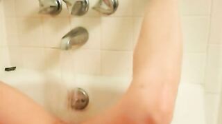 Shy girl next door masturbating in bathtub