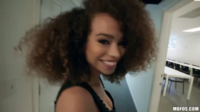 Curly haired black beauty slobbers a big cock