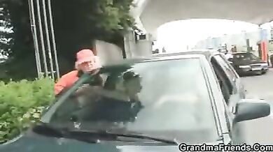 Horny old car cleaning lady goes for a ride and sucks two random guys cocks
