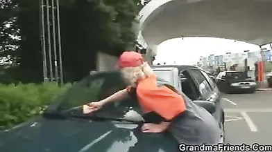 Horny old car cleaning lady goes for a ride and sucks two random guys cocks