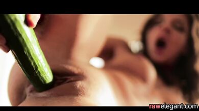 Babe orgasms while using cucumber
