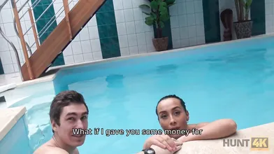 HUNT4K Slim brunette has sex with stranger by the pool near her man
