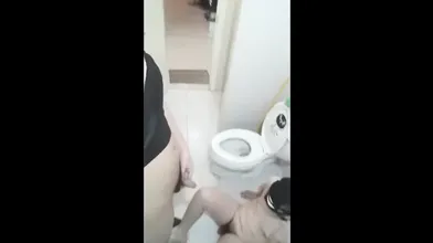 Asian Ladyboy dominatrix and a small cock  make him cum with a handjob