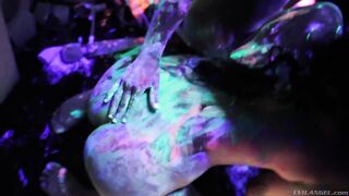 Hot lesbians playing with fluorescent body paint
